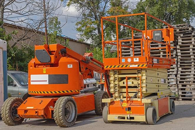 warehouse worker operating forklift to stack inventory in Brusly