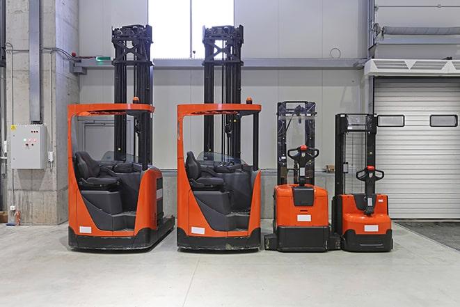 fleet of forklifts at a storage facility